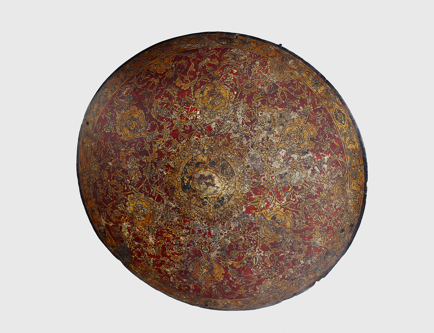 Venetian round shield in oriental style, ca. 1600, probably from the pageantry equipment under Archbishop Mark Sittich, leather, inv. no. WA 3598